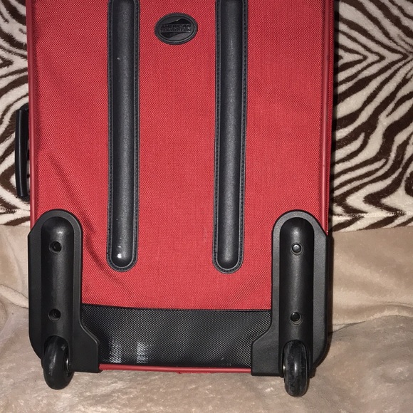 American Tourister Bags American Tourister Wheeled Luggage Red And